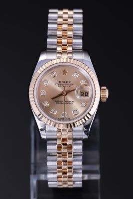 Rolex Oyster Perpetual Datejust damearmbåndsur af 18 kt. guld og stål med bri...