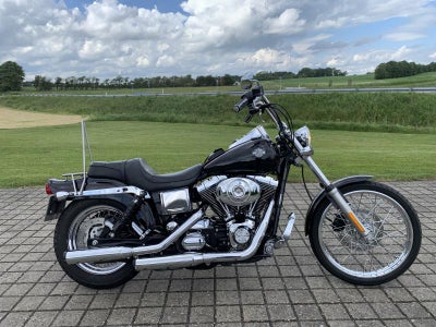 Harley-Davidson FXDWG Dyna Wide Glide HMC Motorcykler. Vi bytter gerne.