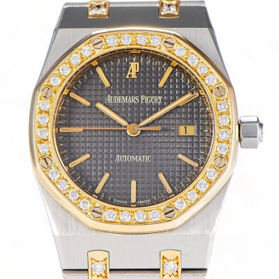 AUDEMARS PIGUET ROYAL OAK  STEEL WITH CUSTOM GOLD AND DIAMOND BEZEL